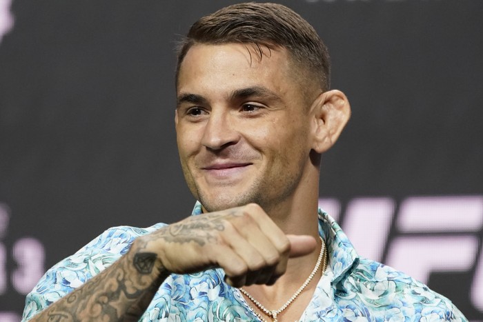 Dustin Poirier motions to the crowd during a news conference for a UFC 264 mixed martial arts bout Thursday, July 8, 2021, in Las Vegas. Poirier is scheduled to fight Conor McGregor in a lightweight bout Saturday in Las Vegas (AP Photo/John Locher)