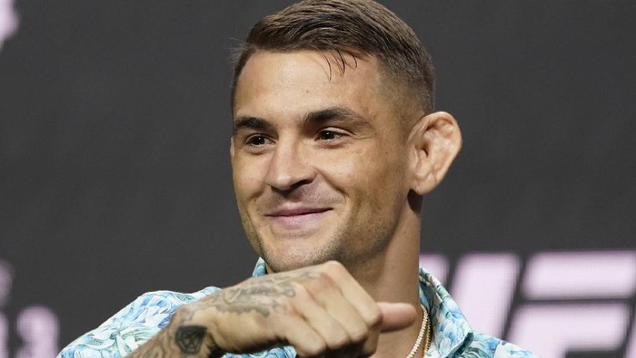 Dustin Poirier motions to the crowd during a news conference for a UFC 264 mixed martial arts bout Thursday, July 8, 2021, in Las Vegas. Poirier is scheduled to fight Conor McGregor in a lightweight bout Saturday in Las Vegas (AP Photo/John Locher)