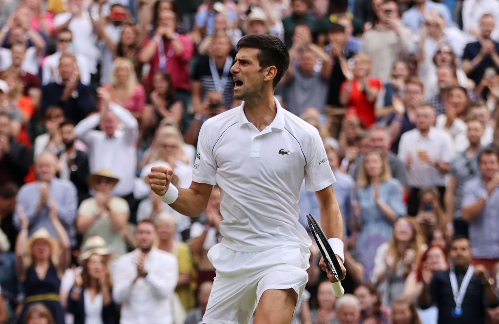 Novak Djokovic LONDON, ENGLAND - JULY 09: Novak Djokovic of Serbia celebrates match point in his Men's Singles Semi-Final match against Denis Shapovalov of Canada during Day Eleven of The Championships - Wimbledon 2021 at All England Lawn Tennis and Croquet Club on July 09, 2021 in London, England. (Photo by Clive Brunskill/Getty Images)