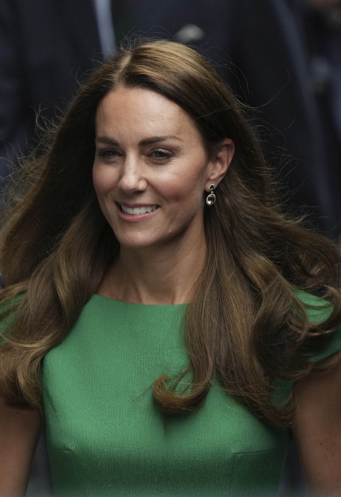 Kate, Duchess of Cambridge, walks for the presentation ceremony for the womens singles on day twelve of the Wimbledon Tennis Championships in London, Saturday, July 10, 2021. (AP Photo/Alberto Pezzali)
