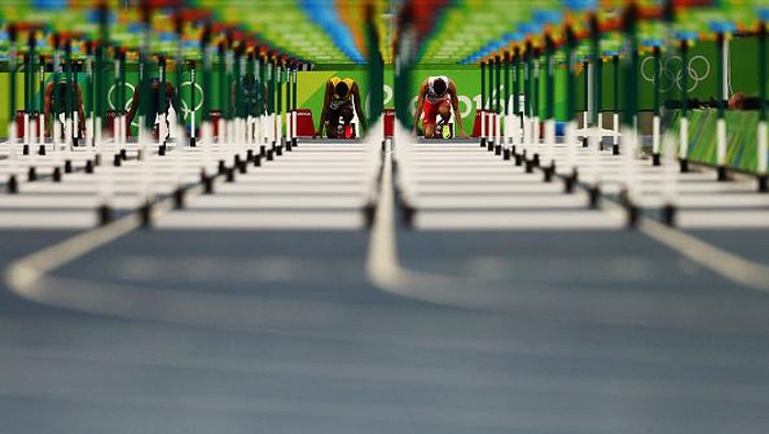 Olimpiade tak hanya ditunggu para Atlet, fotografer pun menunggu ajang ini untuk abadikan momen yang memukau mata. Berikut beragam foto memukau di Olimpiade Rio