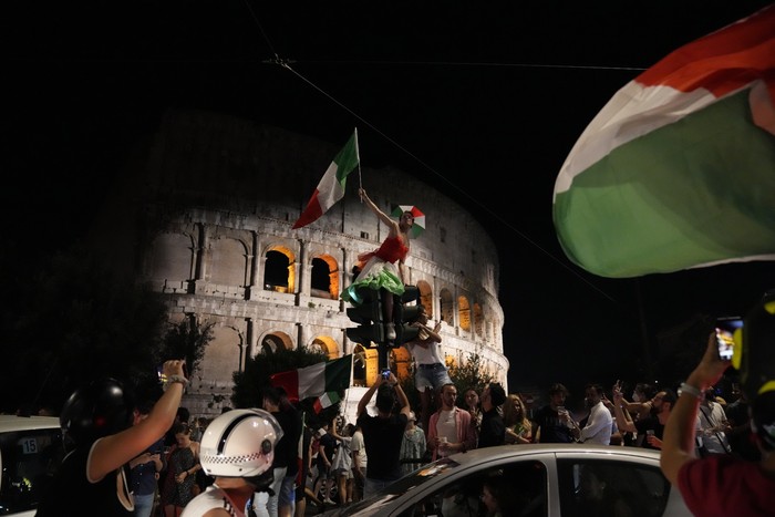 Italy England Euro 2020 Soccer Italy's fans celebrate in Rome, Monday, July 12, 2021, after Italy beat England to win the Euro 2020 soccer championships in a final played at Wembley stadium in London. Italy beat England 3-2 in a penalty shootout after a 1-1 draw. (AP Photo/Alessandra Tarantino)