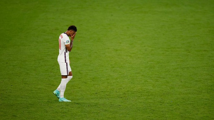 LONDON, ENGLAND - JULY 11: Marcus Rashford of England reacts after missing their teams third penalty in the penalty shoot out during the UEFA Euro 2020 Championship Final between Italy and England at Wembley Stadium on July 11, 2021 in London, England. (Photo by John Sibley - Pool/Getty Images)