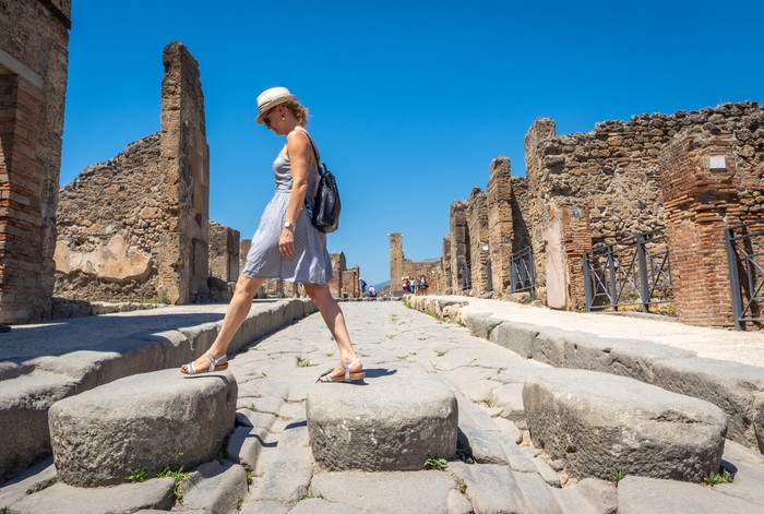 Pompeii, Italy - August 6, 2017: tourist walking in the ruins of pompeii