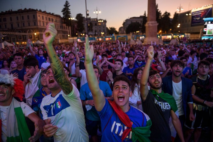 Tifosi Italia ROME, ITALY - JULY 11: Italian fans watch on giant screens at Piazza del Popolo fan zone the Euro 2020 Final match between Italy and England, played at Wembley stadium, on July 11, 2021 in Rome, Italy. Italy's national football team remain unbeaten in their last 33 games and meet England, playing in their first major final for 55 years, in the European Championships Final. The tournament was postponed from last year due to the Covid-19 pandemic. (Photo by Antonio Masiello/Getty Images)