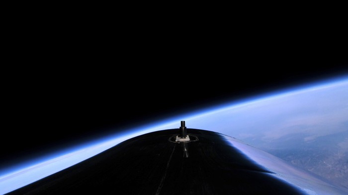 In this photo provided by Virgin Galactic, Richard Branson, bottom center, and his crew members experience zero gravity aboard his winged rocket ship on Sunday, July 11, 2021. Branson and five crewmates from his Virgin Galactic space-tourism company reached an altitude of about 53 miles (88 kilometers) over the New Mexico desert — enough to experience three to four minutes of weightlessness and see the curvature of the Earth.   (Virgin Galactic via AP)