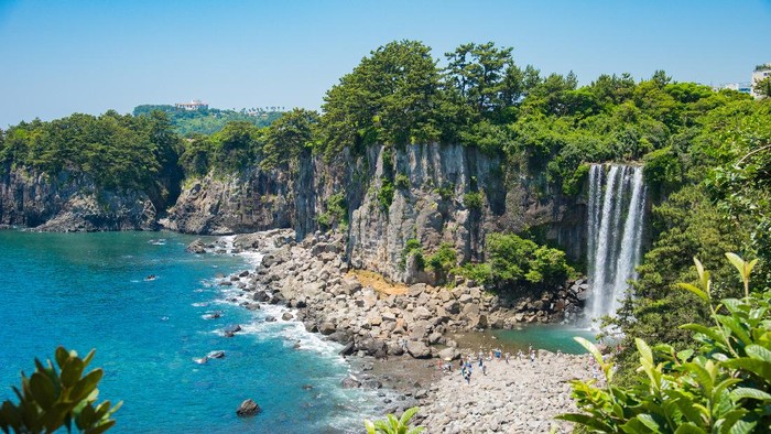 The Jeongbang Waterfall which falls directly into the sea, Jeju-do, South Korea