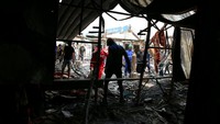 Kementerian Dalam Negeri Iran mengatakan kebakaran berawal dari ruang temporer yang bersebelahan dengan Gedung utama. AP Photo/Khalid Mohammed.