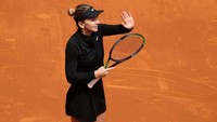 Halep mundur karena masalah cedera betis yang dialaminya. Getty Images/Clive Brunskill  