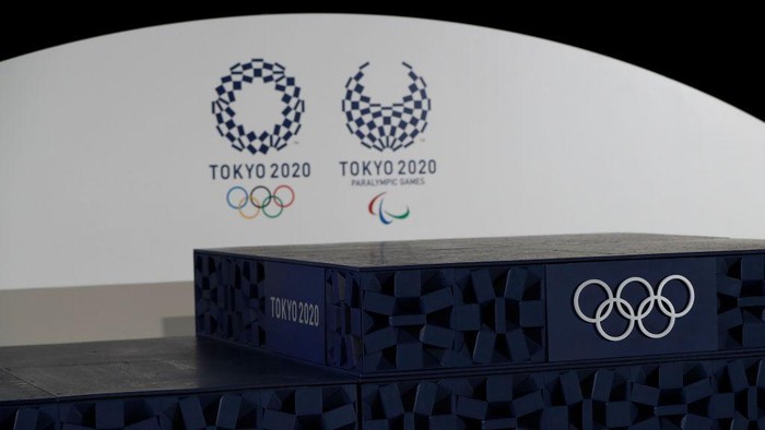 TOKYO, JAPAN - JUNE 03: The Victory podium that will be used during the victory ceremonies at the Tokyo 2020 Olympic Games is displayed during an unveiling event for the victory ceremonies items including podium, music, costume and medal tray for the Olympic and Paralympic games at the Ariake Arena on the day marking the 50 days to go to the Tokyo Olympic Games opening ceremony on June 3, 2021 in Tokyo, Japan. (Photo by Issei Kato - Pool/Getty Images)