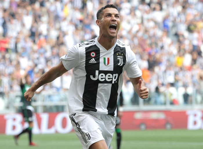 TURIN, ITALY - SEPTEMBER 16:  Cristiano Ronaldo of Juventus FC celebrates after scoring the opening goal during the serie A match between Juventus and US Sassuolo at Allianz Stadium on September 16, 2018 in Turin, Italy.  (Photo by Emilio Andreoli/Getty Images)