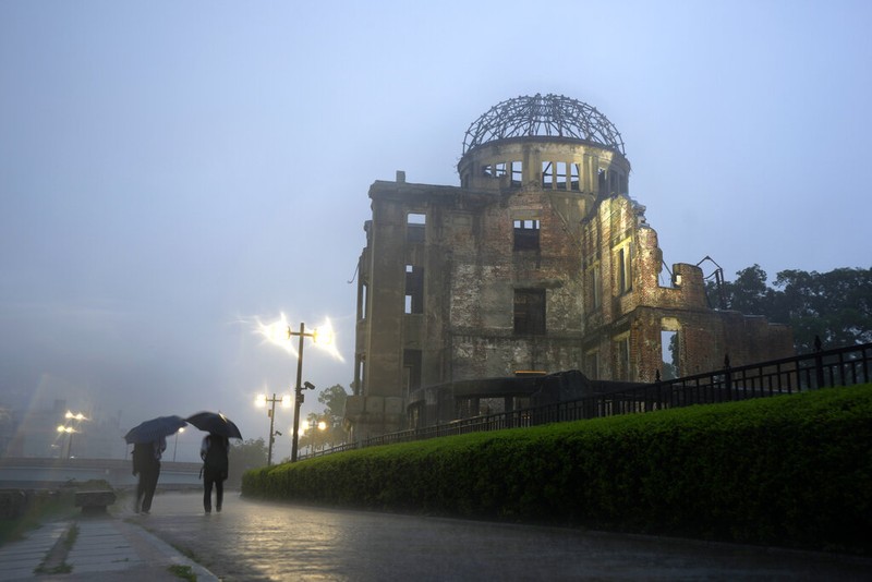 A man walks near the Atomic Bomb Dome Friday, July 16, 2021, in Hiroshima, western Japan. Japan will mark the 76th anniversary of the atomic bombing on Hiroshima on Aug. 6. (c)