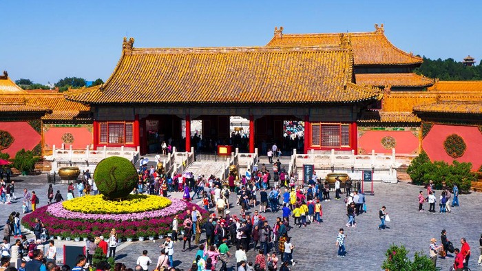 Beijing, China - September 29, 2018: Tourists entering Forbidden city imperial palace complex in central Beijing, China on a sunny day