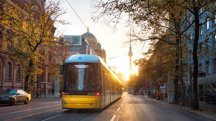 yellow train at early morning in Berlin Oranienburger Strasse