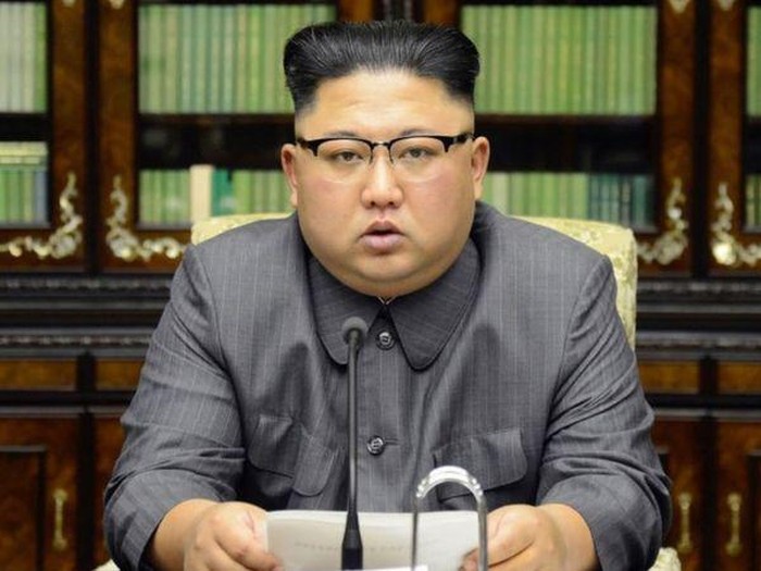 Di sini tak ada gaya rambut seperti milik Korea Selatan, kata Kim Jong-un (AFP via Getty Images)