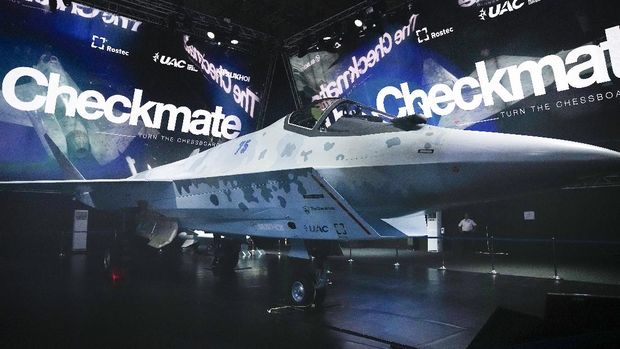 A prototype of Russia's prospective fighter jet is displayed at the MAKS-2021 International Aviation and Space Salon in Zhukovsky outside Moscow, Russia, Tuesday, July 20, 2021. Russia on Tuesday unveiled a prototype of its prospective new fighter jet at the air show. (AP Photo/Alexander Zemlianichenko)