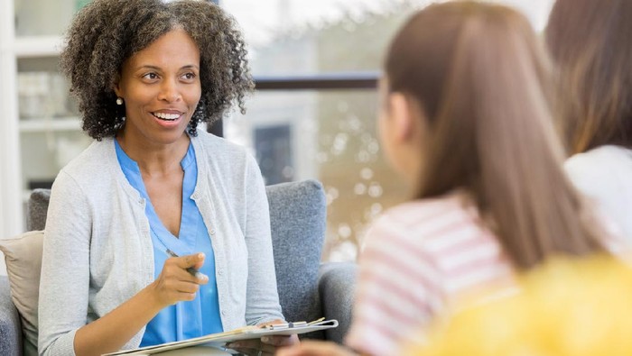 counsellor advising high school student