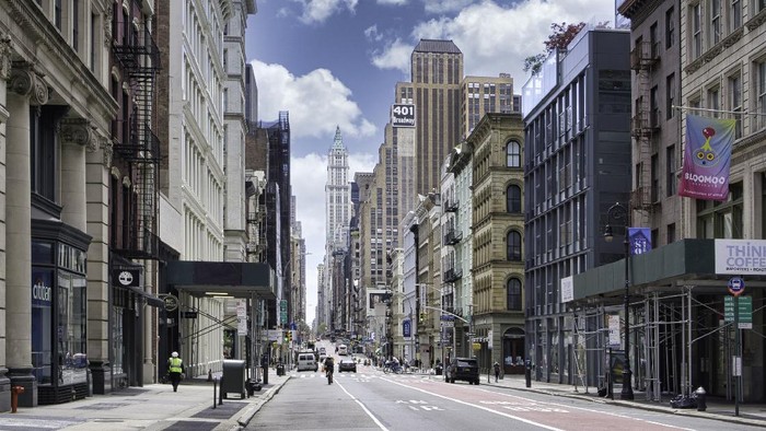 New York City street road in Manhattan at summer time. Urban big city life concept background