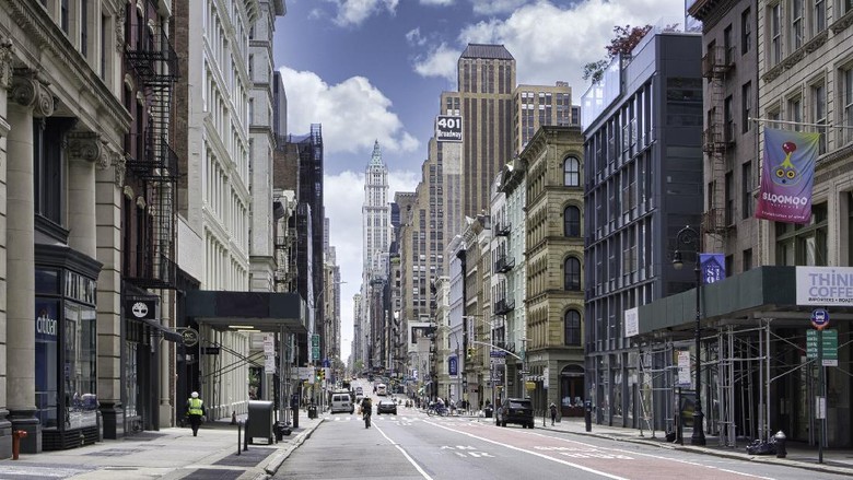 Manhattan New York City street road in Manhattan at summer time. Urban big city life concept background