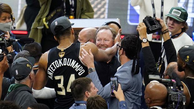 Milwaukee Bucks head coach Mike Budenholzer watches form the bench during the first half of Game 6 of basketball's NBA Finals against the Phoenix Suns in Milwaukee, Tuesday, July 20, 2021. (AP Photo/Paul Sancya)