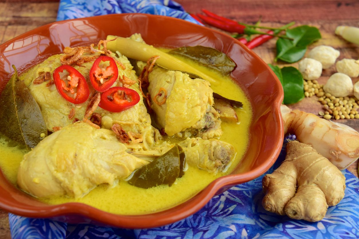 Indonesian food Opor Ayam, chicken cooked in coconut milk and spices. Served to celebrate Idul Fitri / Lebaran