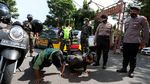 Utak Atik Kebijakan PPKM Kala RI Dijuluki Episentrum COVID Dunia