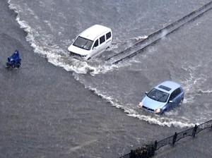 Banjir di China Tewaskan 302 Orang