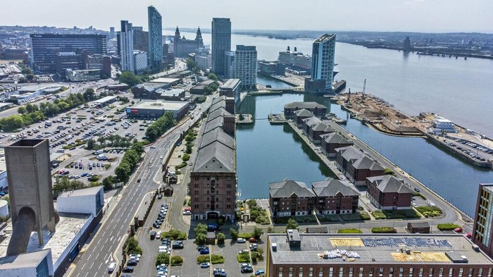 Waduh, Kampung Asal The Beatles Dicoret dari Warisan Dunia UNESCO An aerial view of Liverpool waterfront, which has been removed from the World Heritage List Wednesday July 21, 2021. The UN World Heritage committee found developments including the new Everton soccer stadium threaten the value of the city's waterfront and they have removed the area from the World Heritage List. (Peter Byrne/PA via AP)