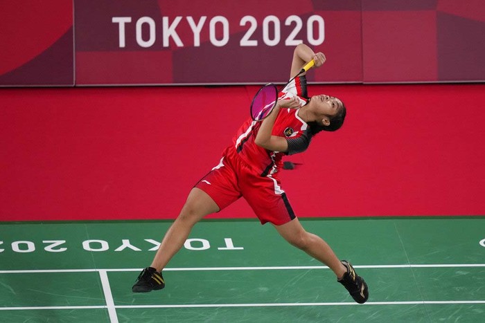 Indonesias Gregoria Mariska Tunjung competes against Myanmars Thuzar Thet Htar during their womens singles badminton match at the 2020 Summer Olympics, Sunday, July 25, 2021, in Tokyo, Japan. (AP Photo/Dita Alangkara)