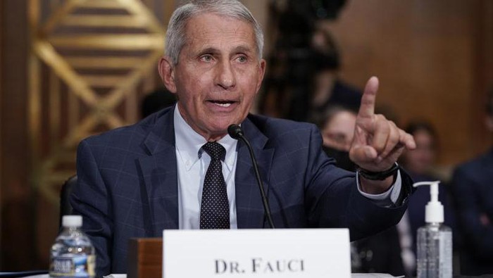 Top infectious disease expert Dr. Anthony Fauci responds to accusations by Sen. Rand Paul, R-Ky., as he testifies before the Senate Health, Education, Labor, and Pensions Committee, on Capitol Hill in Washington, Tuesday, July 20, 2021. Cases of COVID-19 have tripled over the past three weeks, and hospitalizations and deaths are rising among unvaccinated people. (AP Photo/J. Scott Applewhite, Pool)