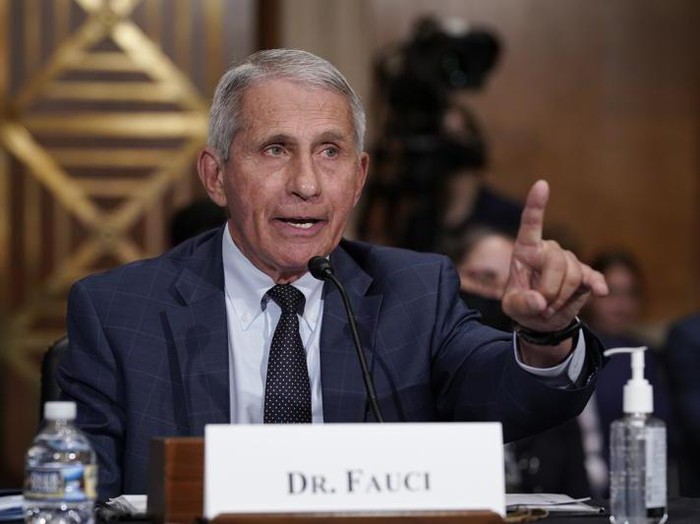 Top infectious disease expert Dr. Anthony Fauci responds to accusations by Sen. Rand Paul, R-Ky., as he testifies before the Senate Health, Education, Labor, and Pensions Committee, on Capitol Hill in Washington, Tuesday, July 20, 2021. Cases of COVID-19 have tripled over the past three weeks, and hospitalizations and deaths are rising among unvaccinated people. (AP Photo/J. Scott Applewhite, Pool)