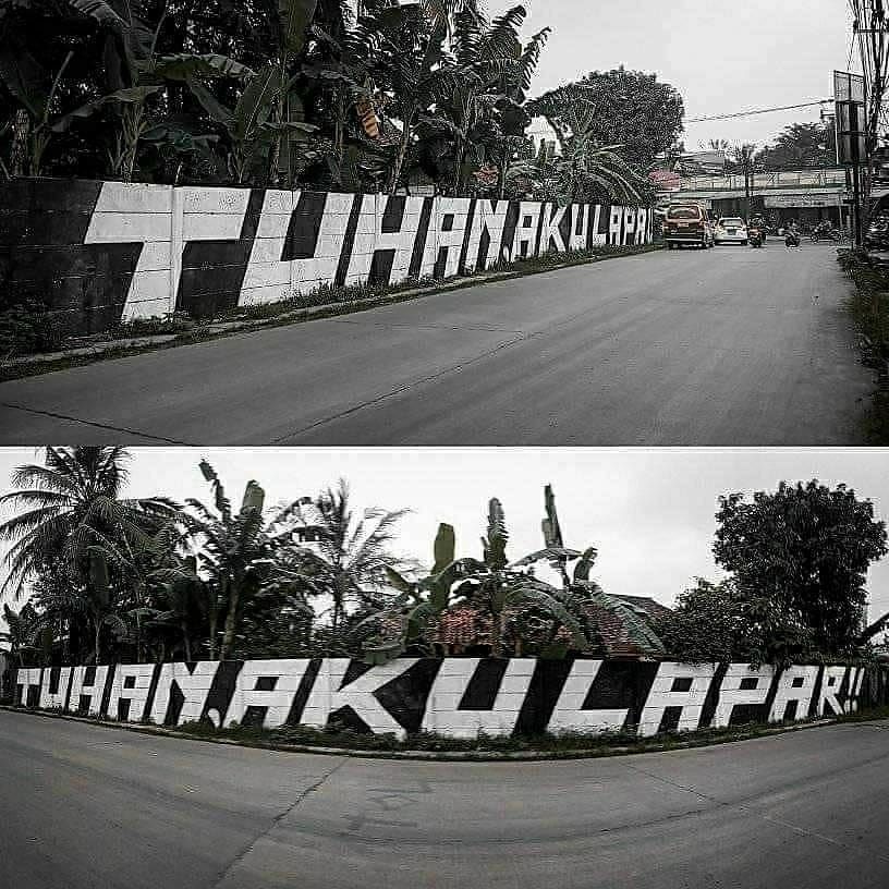 Grafiti 'Tuhan Aku Lapar' di Tigaraksa, Tangerang, sebelum dihapus petugas