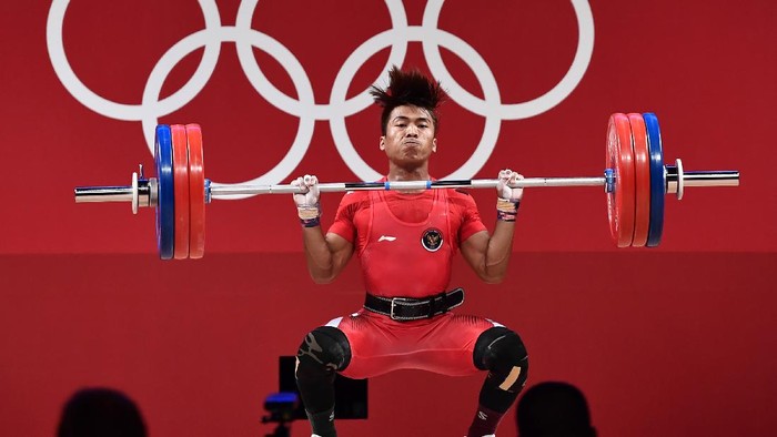 Lifter Indonesia, Deni, gagal merebut medali di Olimpiade Tokyo 2020. Bermain di kelas 67 kg, Deni menempati peringat 9 dengan angkatan total 301 kg.