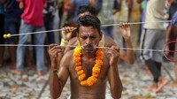 Meski di tengah pandemi, ritual ini tetap dilakukan di Jammu, India, Minggu (25/7/2021).