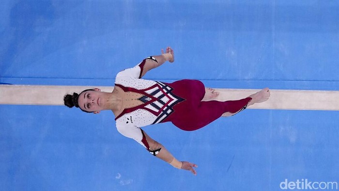 Tokyo Olympics Artistic Gymnastics Pauline Schaefer-Betz, of Germany, performs on the beam during women's artistic gymnastic qualifications at the 2020 Summer Olympics, Sunday, July 25, 2021, in Tokyo. (AP Photo/Morry Gash)