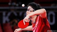 Pasangan Jepang tersebut mengalahkan lawannya dengan skor 5-11, 7-11, 11-8, 11-9, 11-9, 6-11, 11-6. Steph Chambers/Getty Images.