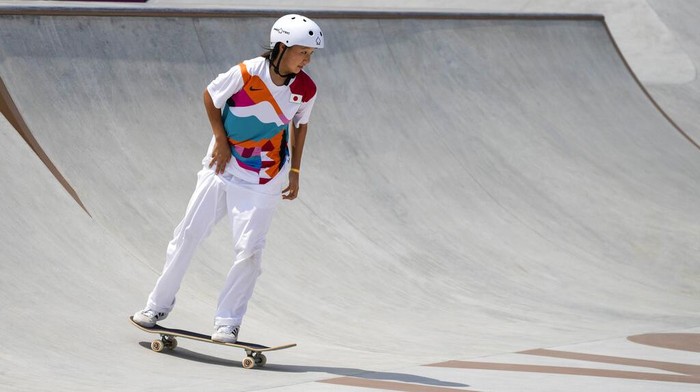 Momiji Nishiya of Japan, who won the gold medal, competes in the women's street skateboarding finals at the 2020 Summer Olympics, Monday, July 26, 2021, in Tokyo, Japan. (AP Photo/Ben Curtis)