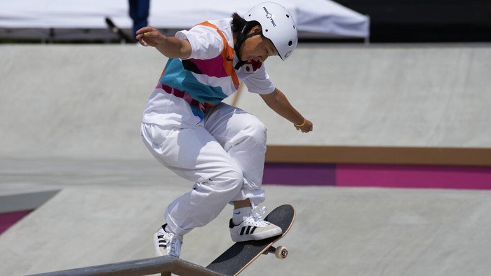 Momiji Nishiya of Japan, who won the gold medal, competes in the women's street skateboarding finals at the 2020 Summer Olympics, Monday, July 26, 2021, in Tokyo, Japan. (AP Photo/Ben Curtis)