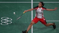 Tunggal putri Indonesia Gregoria Mariska Tunjung mengembalikan kok ke arah tunggal putri Belgia Lianne Tan dalam penyisihan Grup M Olimpiade Tokyo 2020 di Musashino Forest Sport Plaza, Tokyo, Jepang, Rabu (28/7/2021). Antara Foto/Sigid Kurniawan