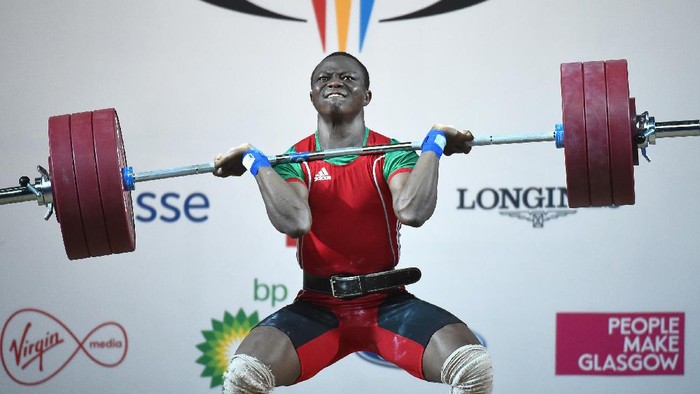 GLASGOW, SCOTLAND - JULY 28: Cyrille Tchatchet of Cameroon competes in the mens 85kg weightlifting at the Clyde Auditorium during day five of the Glasgow 2014 Commonwealth Games on July 28, 2014 in Glasgow, United Kingdom.  (Photo by Jeff J Mitchell/Getty Images)