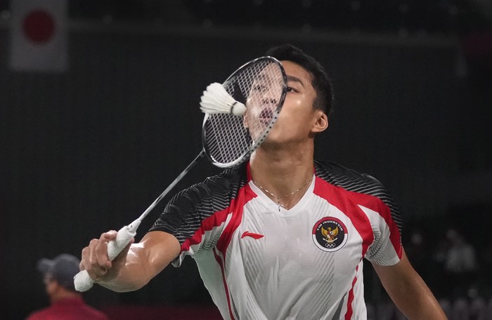Jonatan Christie of Indonesia competes against Singapores Kean Yew Loh during mens singles group play stage Badminton match at the 2020 Summer Olympics, Wednesday, July 28, 2021, in Tokyo, Japan.(AP Photo/Markus Schreiber)