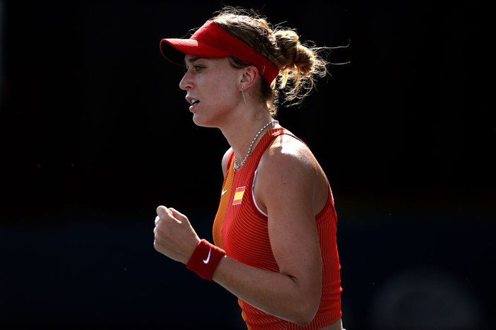 TOKYO, JAPAN - JULY 24: Paula Badosa of Team Spain celebrates victory after her Womens Singles First Round match against Kristina Mladenovic of Team France on day one of the Tokyo 2020 Olympic Games at Ariake Tennis Park on July 24, 2021 in Tokyo, Japan. (Photo by Clive Brunskill/Getty Images)
