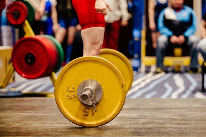 feet man powerlifter before exercise deadlift