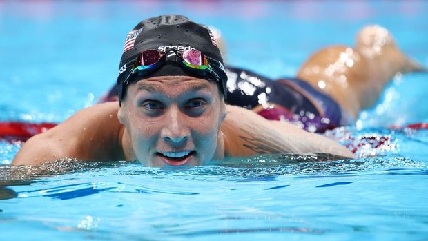 TOKYO, JAPAN - JULY 29: Caeleb Dressel of Team United States reacts after winning the gold medal in the Men's 100m Freestyle Final on day six of the Tokyo 2020 Olympic Games at Tokyo Aquatics Centre on July 29, 2021 in Tokyo, Japan. (Photo by Clive Rose/Getty Images)