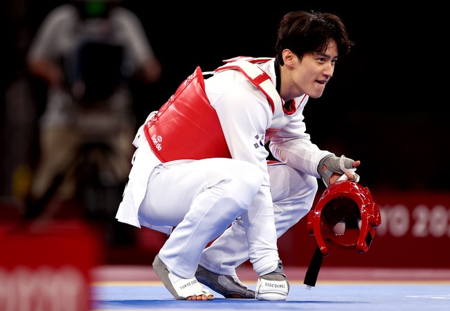 Lee Dae Hoon telah bertanding melawan atlet taekwondo asal Uzbekistan hingga China di Olimpiade Tokyo 2020. Namun, langkahnya harus terhenti pada Minggu (25/7/2021). Foto: dok Maja Hitij_Getty Images