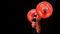 Meski demikian, perjuangan Rahmat terbayar lunas. Bahkan, ia mempertajam rekor angkatan terbaiknya. Sebelumnya, Rahmat memiliki angkatan snatch terbaik 148kg dan clean&jerk 187kg. Chris Graythen/Getty Images.
