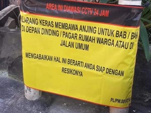 Pria Penganiaya Tetangga Pasang Spanduk Larang Anjing BAB, Ingatkan Risiko
