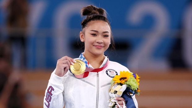 TOKYO, JAPAN - JULY 29: Sunisa Lee of Team United States poses with her gold medal after winning the Women's All-Around Final on day six of the Tokyo 2020 Olympic Games at Ariake Gymnastics Centre on July 29, 2021 in Tokyo, Japan. (Photo by Jamie Squire/Getty Images)