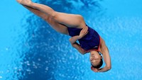 Atlet tuan rumah Jepang, Haruka Enomoto saat melakukan lompatan. (Maddie Meyer/Getty Images)