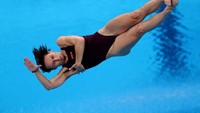 Ekspresi tidak biasa juga terlihat di wajah atlet lompat indah putri asal Ukraina Anna Pysmenska. (Photo by Maddie Meyer/Getty Images)